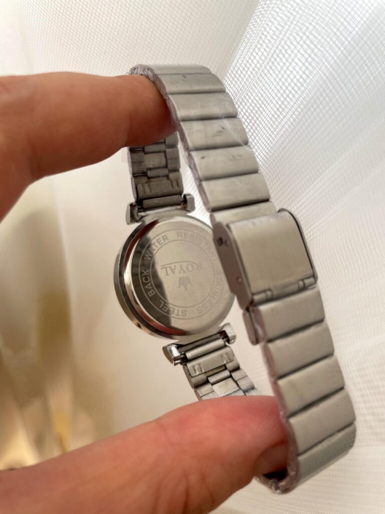 ساعت مچی زنانه رویال با صفحه سبز یخی و بند استیل فنری نقره‌ای، طراحی مینیمال و ظریف